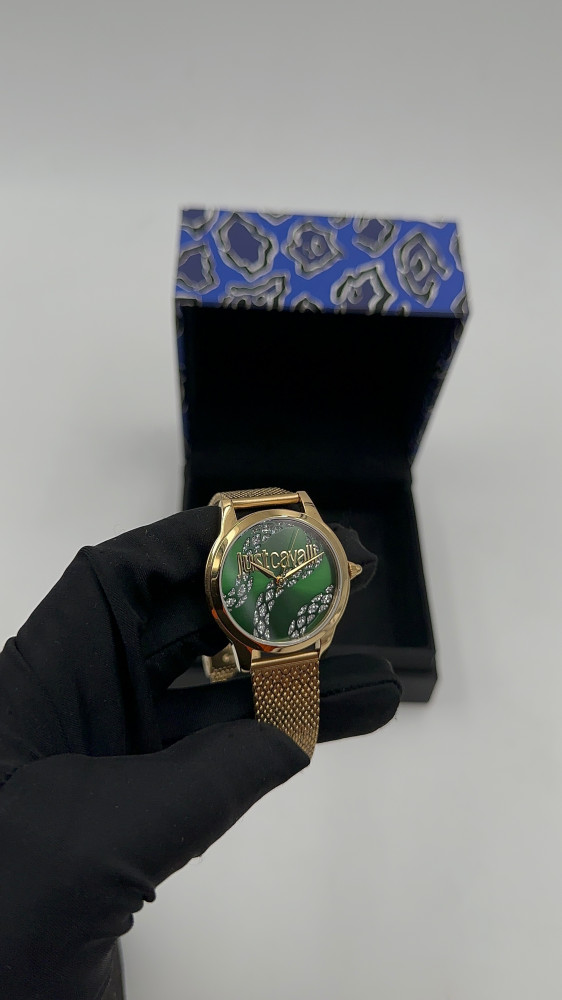 ساعة just cavalli  ذهبي واخضر بكرستال