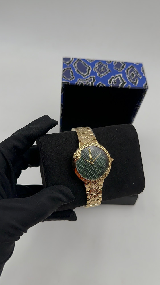 ساعة just cavalli  ذهبي واخضر