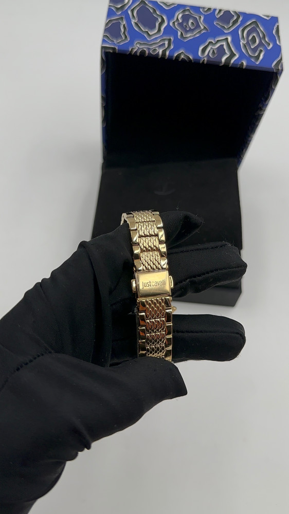 ساعة just cavalli  ذهبي واخضر