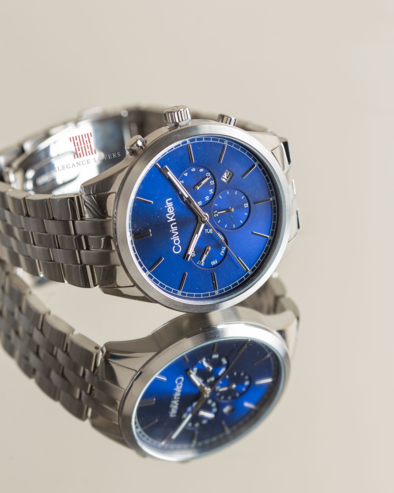 ساعة رجالية ماركة كالفين كلاين - Silver with Blue Dial