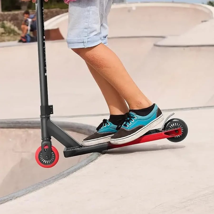 Vokul S1 pro stunt scooter in black and red gradient colorway.