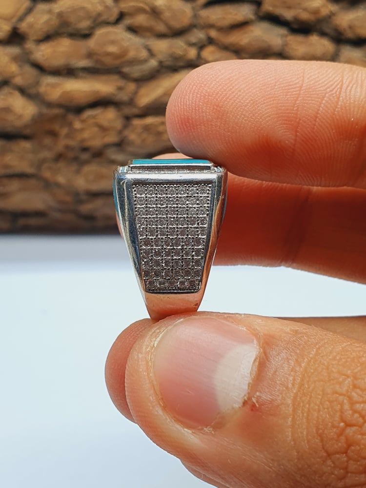 خاتم فضه تالندي مطلي بالروديوم لون الفيروز