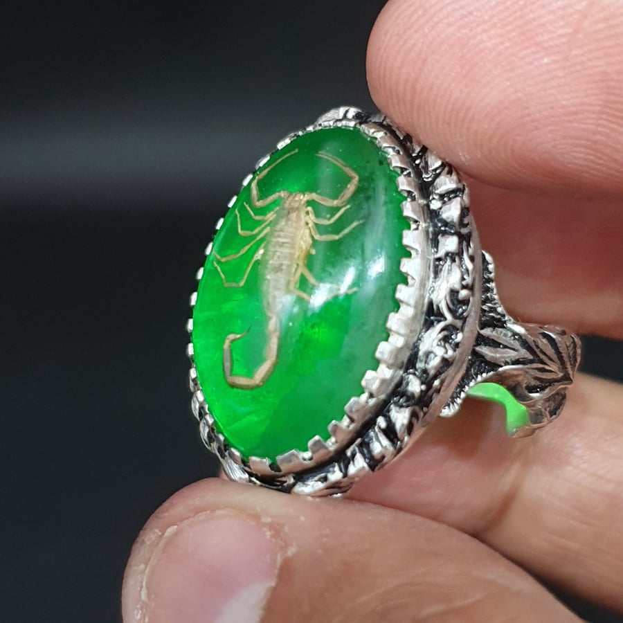 The Scorpio ring in apple color, crafted in the braided soft style