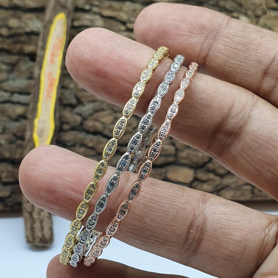 Colorful silver bracelets decorated with Swiss zircon
