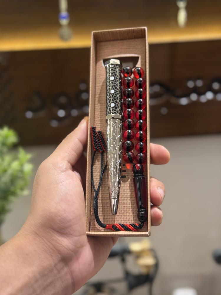 طقم سبحة الموت الحّمر وقلم سانتوس دومو أسود