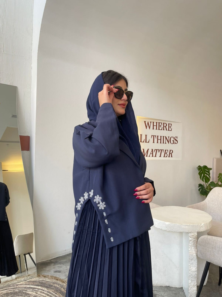 The fabric is crepe, broken linen