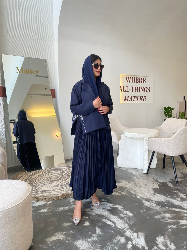 The fabric is crepe, broken linen