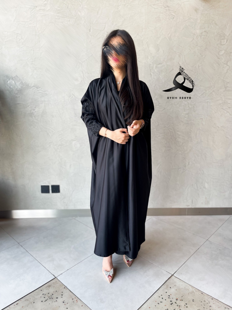 The fabric is light summer, a half thawb design