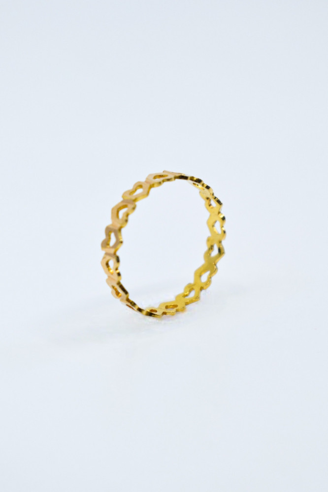 Ring, wedding band, design of stacked hearts forming the path of emotion and endless love. 21-karat pure gold.