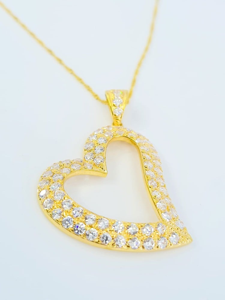 Gold 21 karat necklace in the shape of a heart with zircon