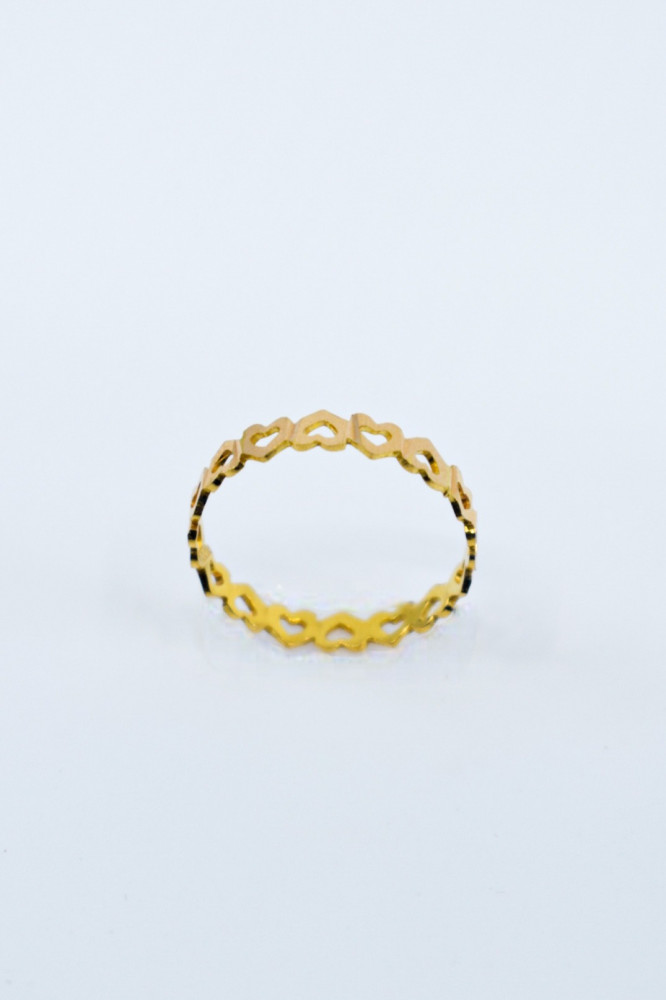 Ring, wedding band, design of stacked hearts forming the path of emotion and endless love. 21-karat pure gold.