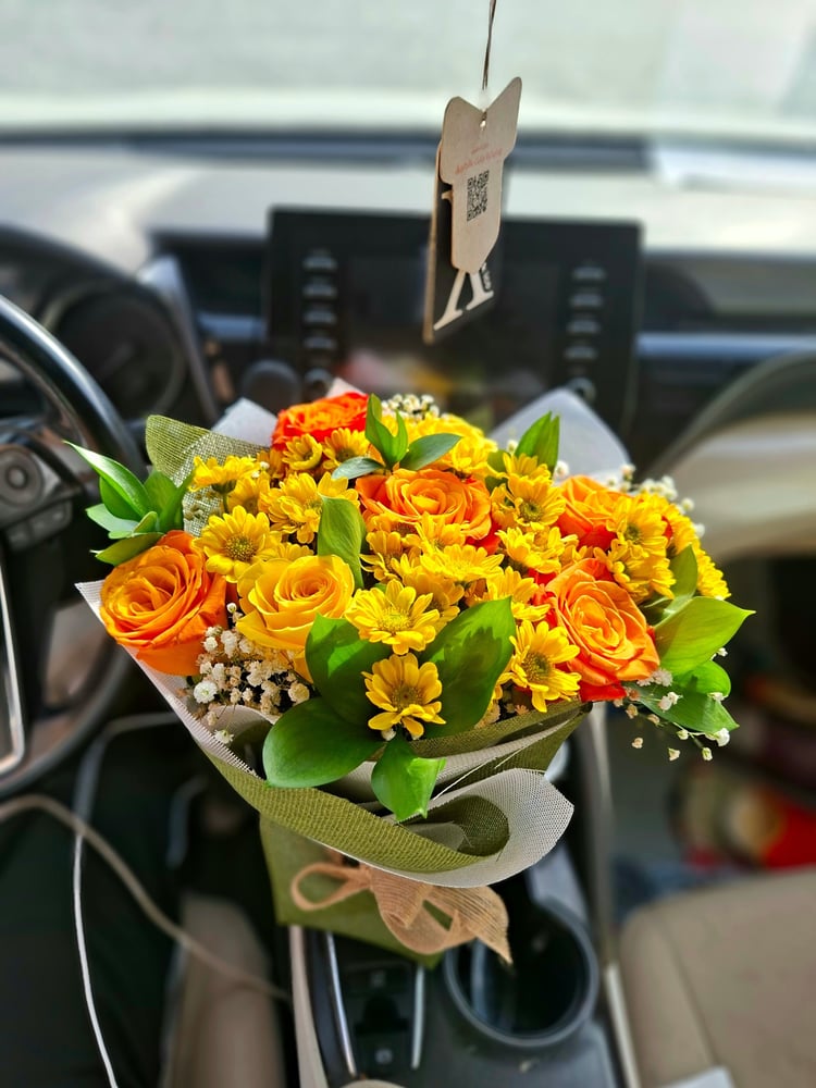 بوكيه الإشراق.. طاقة وحب في تغليفة واحدة" ☀️🧡