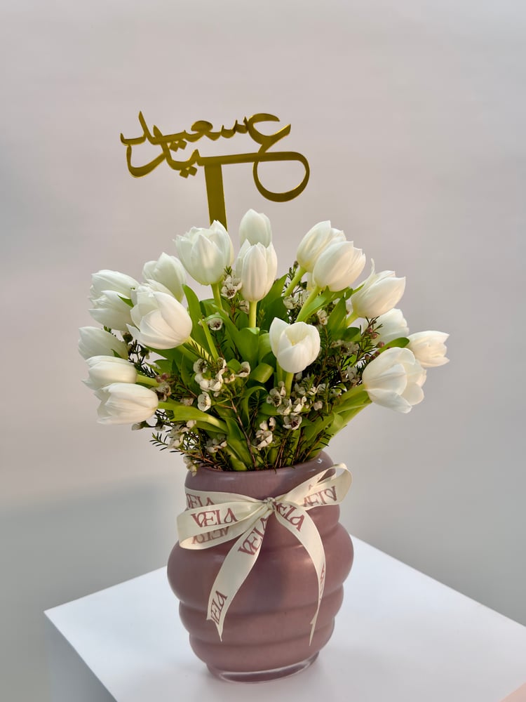 White tulip vase with wax and planting