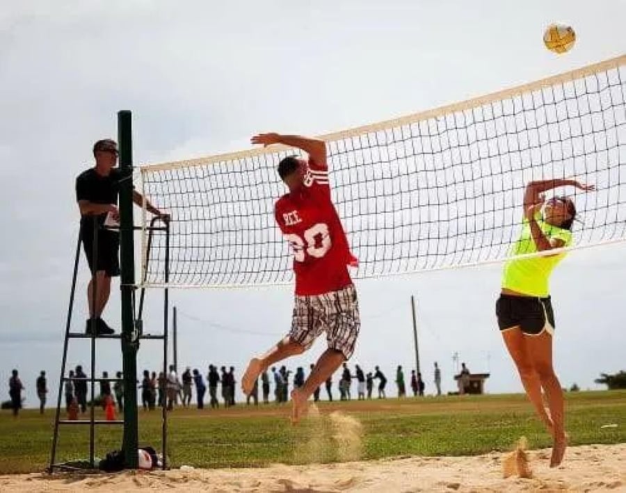 Volleyball net packed in a transparent blue bag.