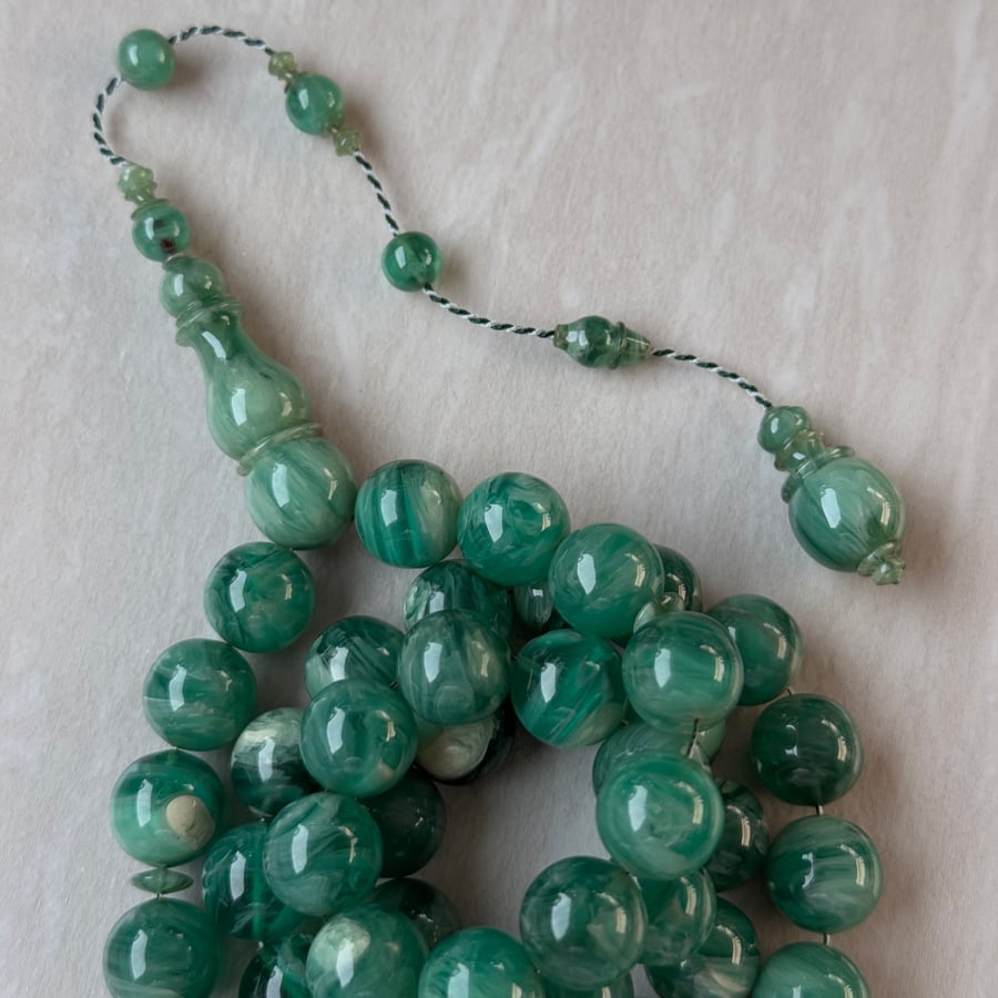 A misbaha with a clasp