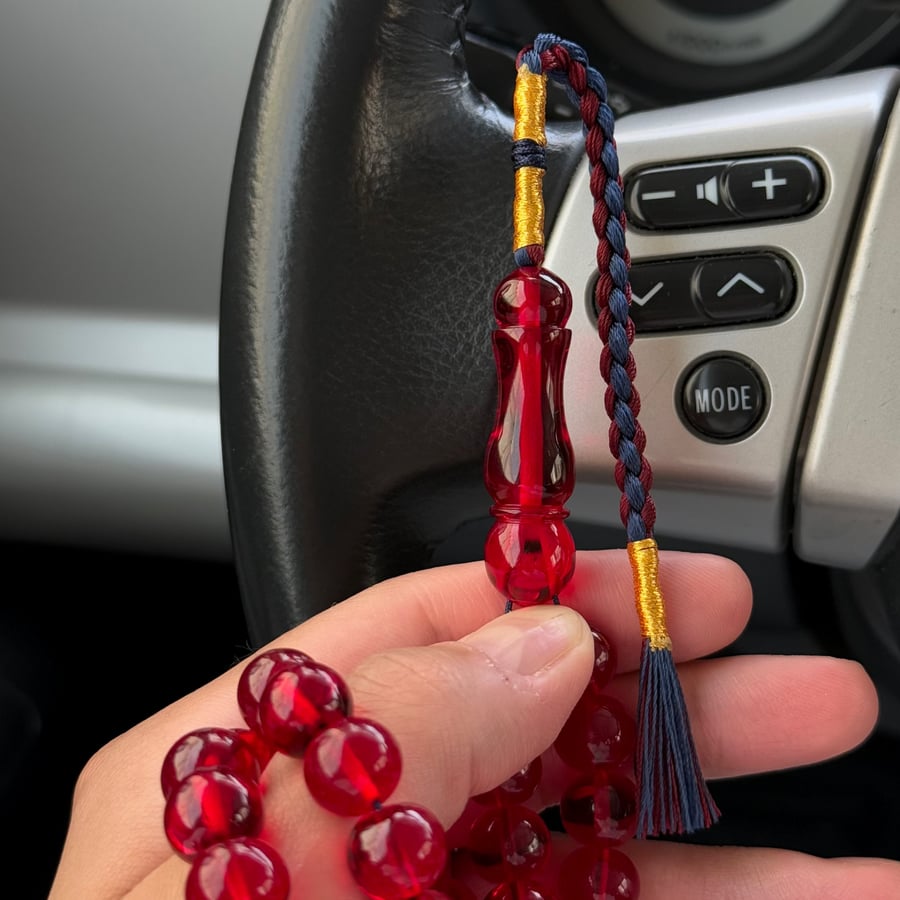 Saffron-colored rosary
