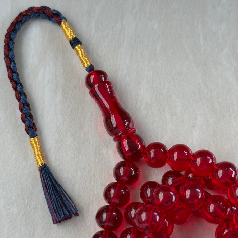 Saffron-colored rosary