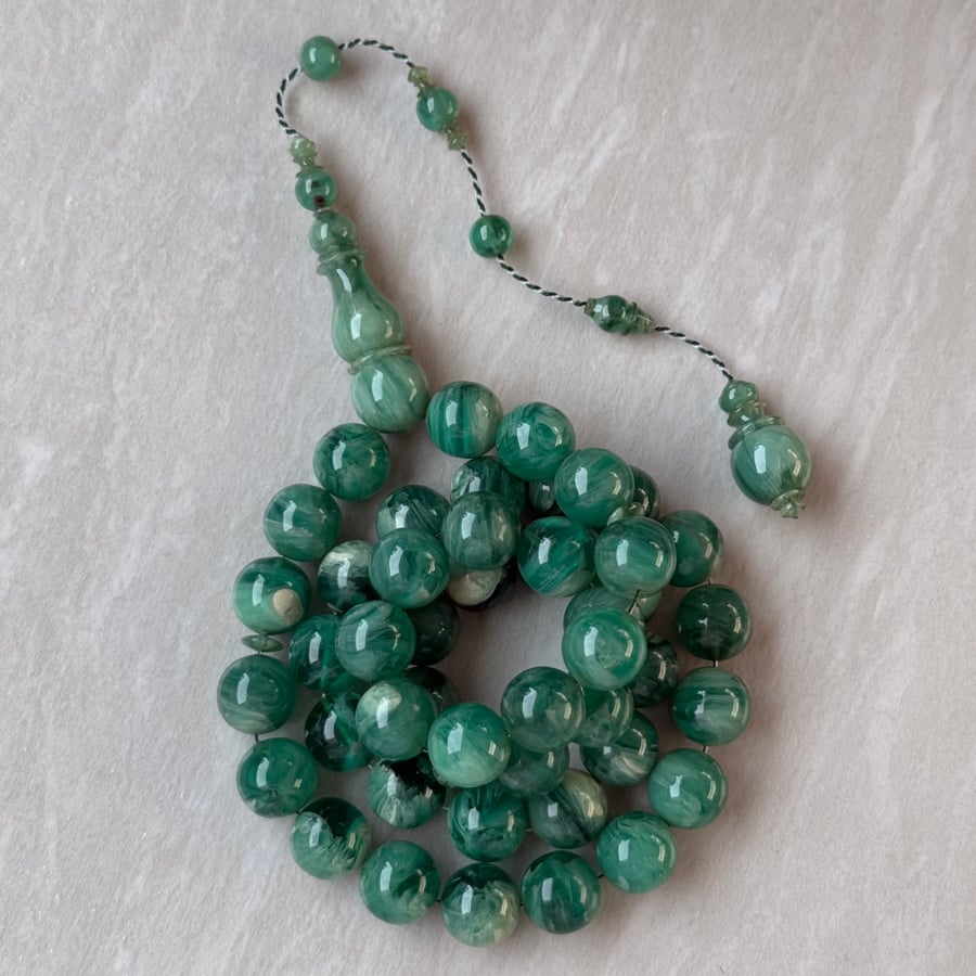 A misbaha with a clasp