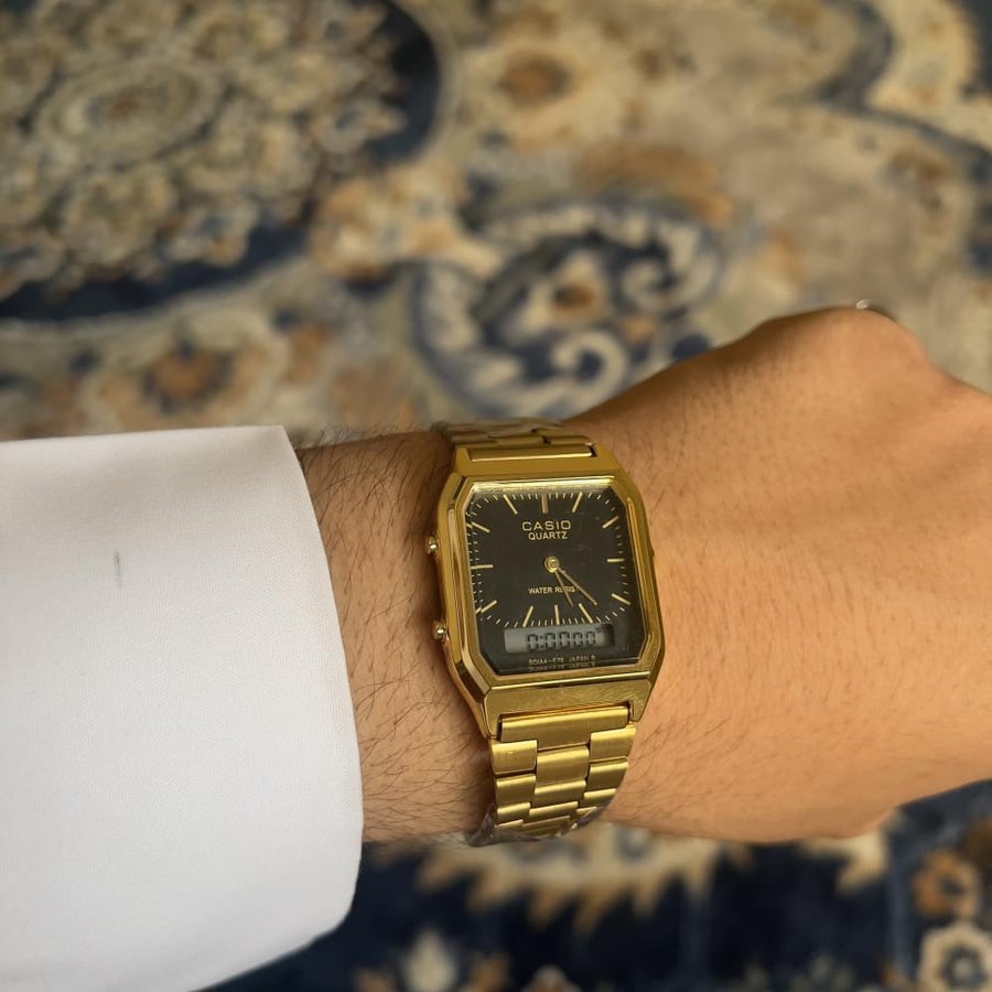 ساعة كاسيو فتنج اطار ذهبي مينا اسود