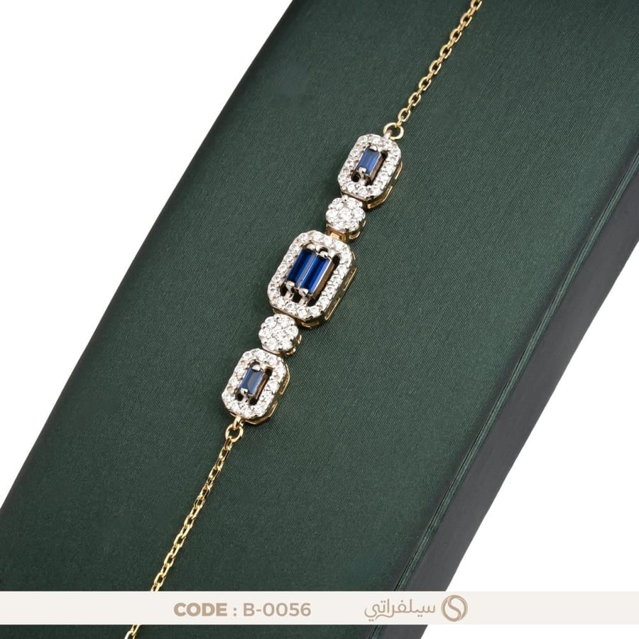 سوار فضة عيار 925 بثلاث وحدات مرصعة بالزركون الأزرق، مطلي بالروديوم وماء الذهب (B-0056)