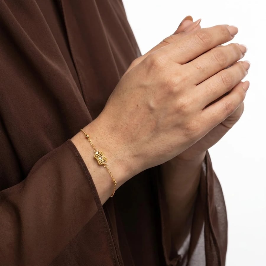 اسوارة ذهب على اليد