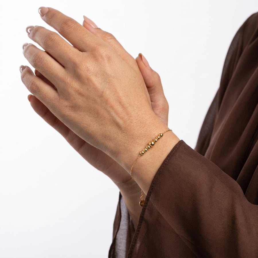 اسوارة ذهب على اليد