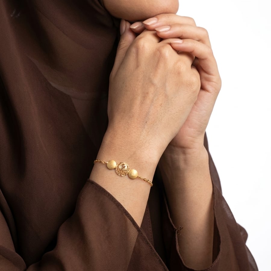 اسوارة ذهب على اليد