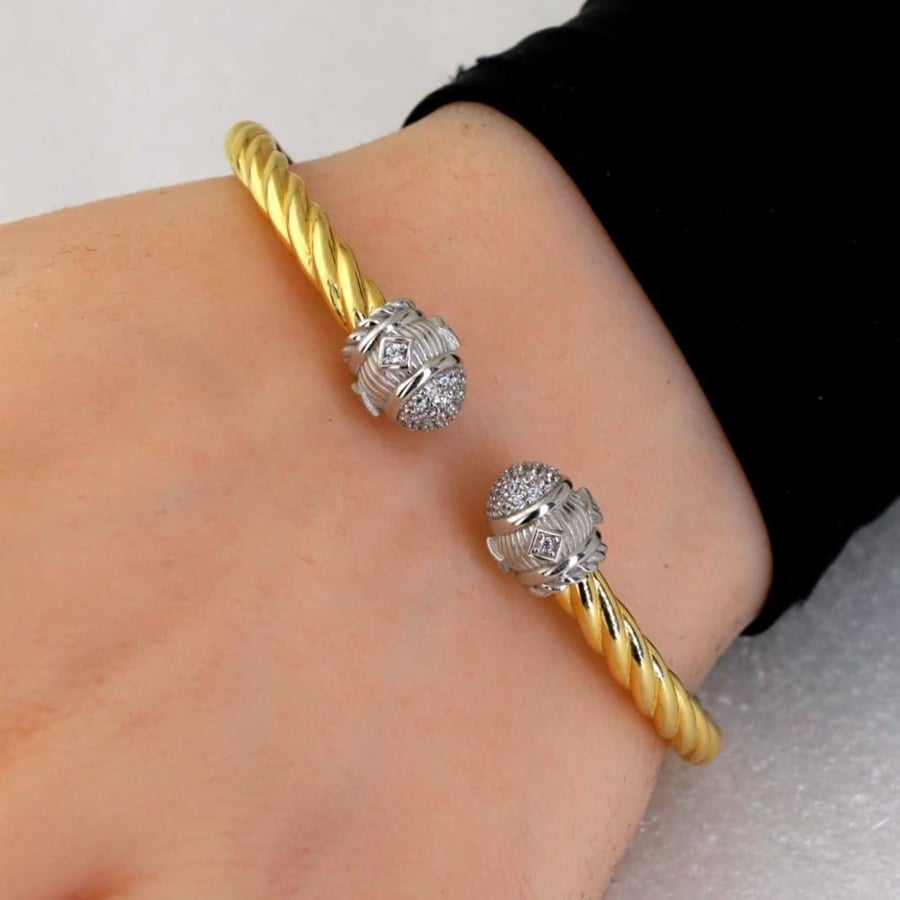 Gold colour twisted puffed standing bracelet