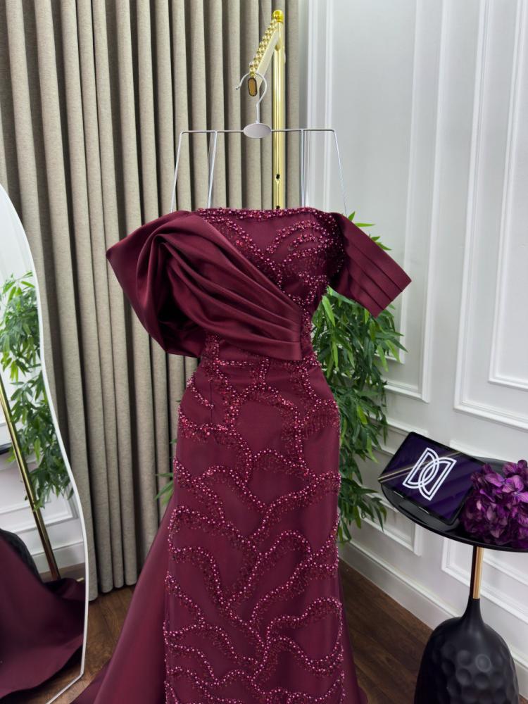Evening dress with tulle embroidery and beadwork, with a Mikado train