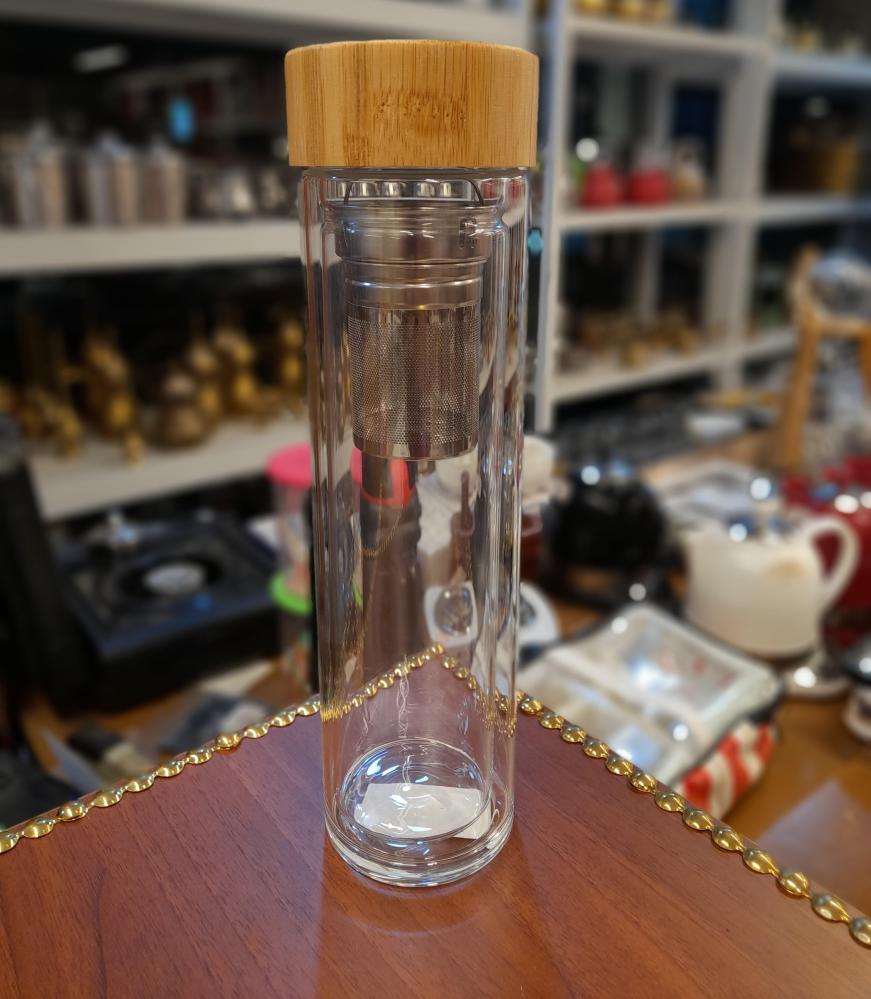 Glass cup with strainer