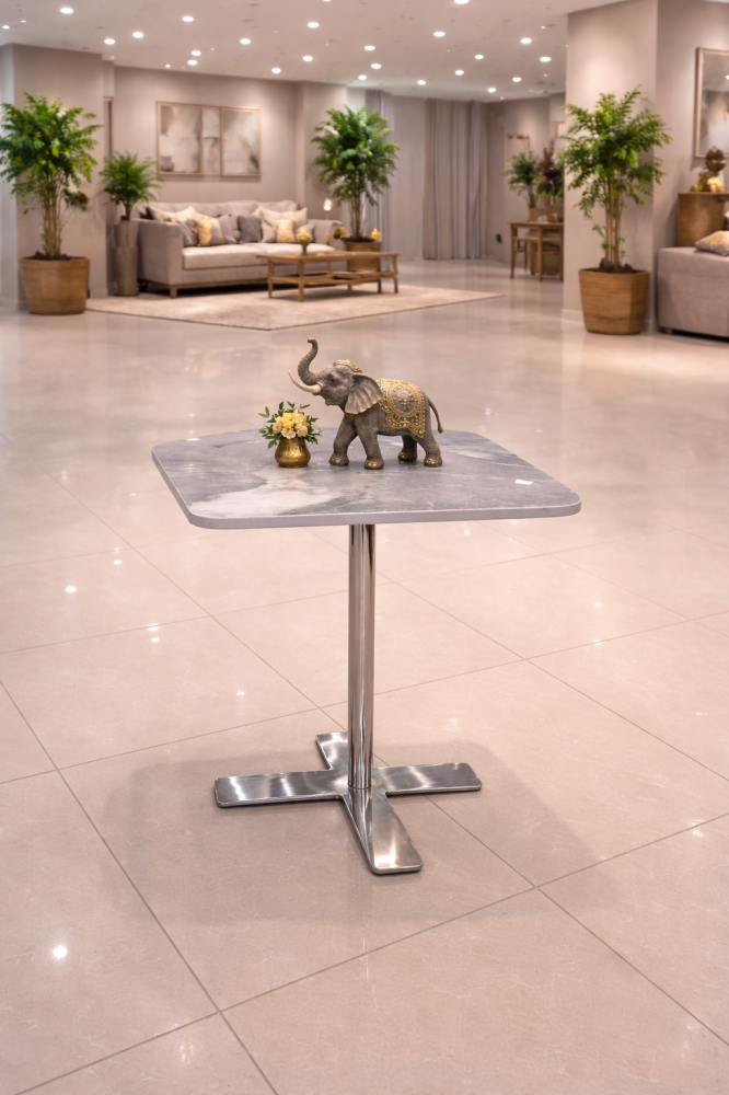 Gray marble serving table with stainless steel base | Difan Al Bakr