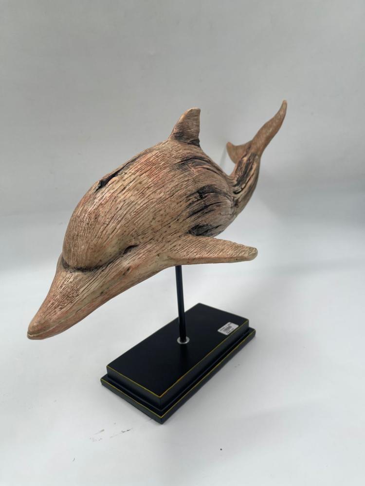 Luxurious wooden dolphin sculpture on an elegant base
