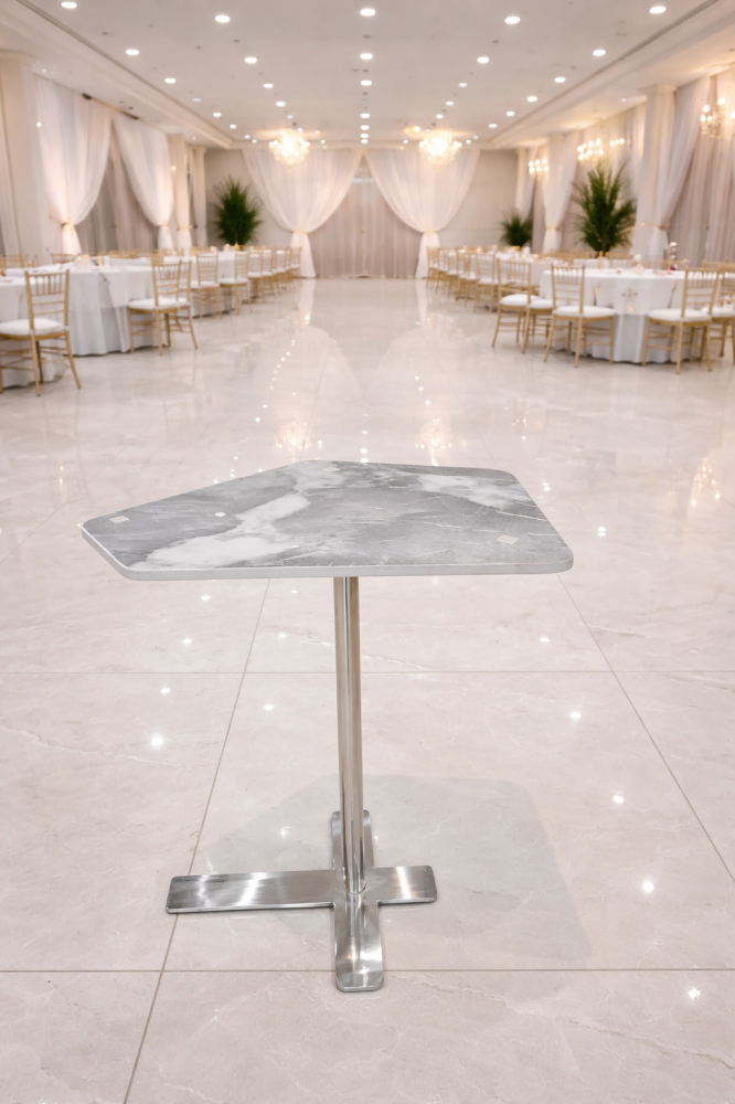 Gray marble serving table with stainless steel base | Difan Al Bakr