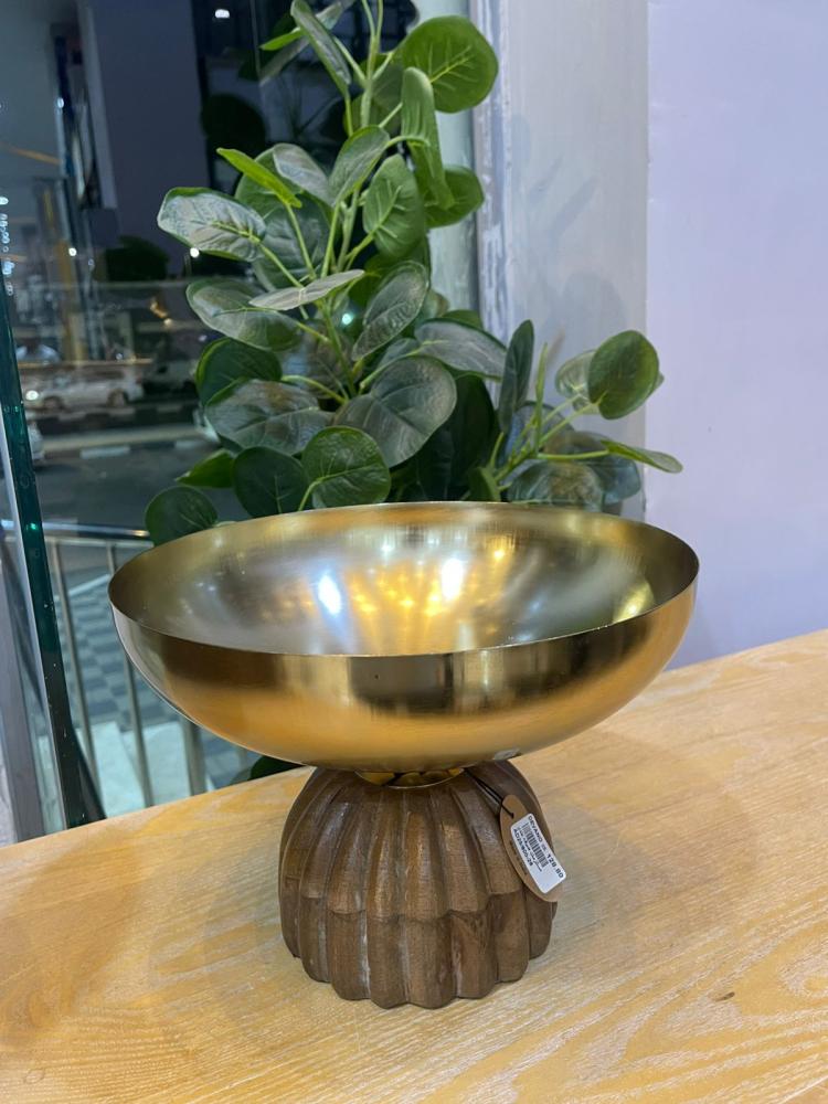 His presentation is Indian with a wooden stand, small size