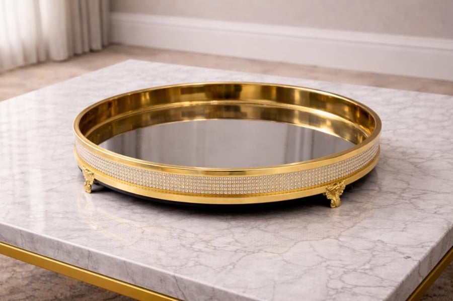 Luxury round serving tray with a golden touch and embellishments
