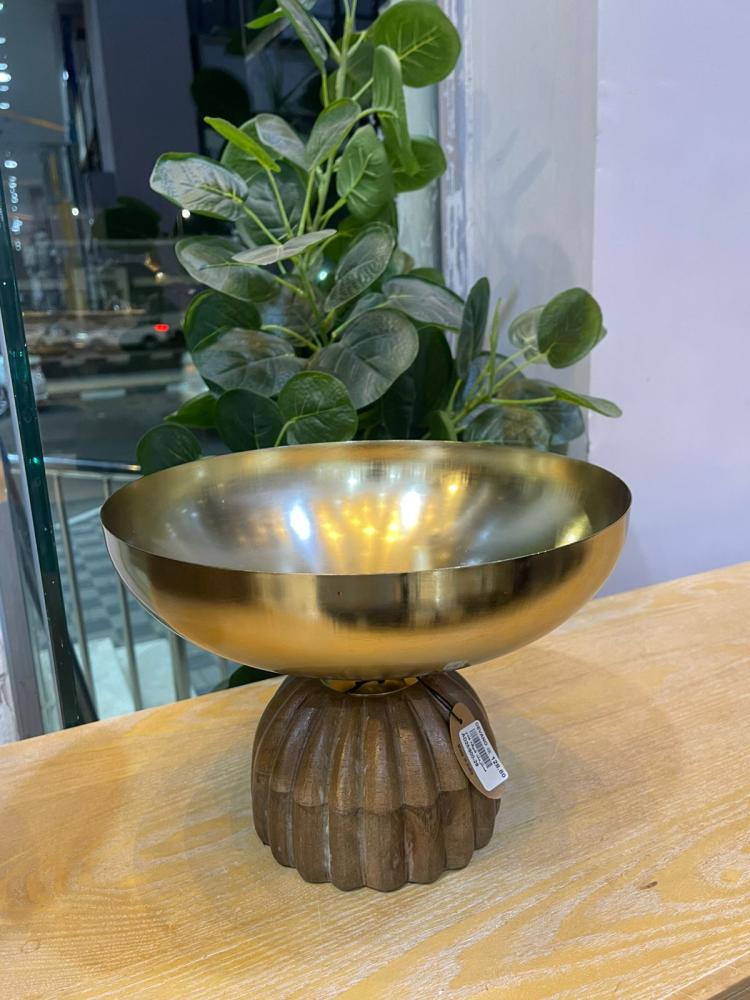 His presentation is Indian with a wooden stand, small size