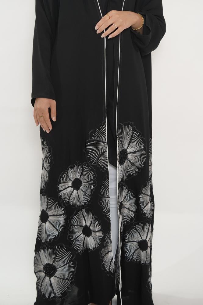 Black abaya decorated with flowers