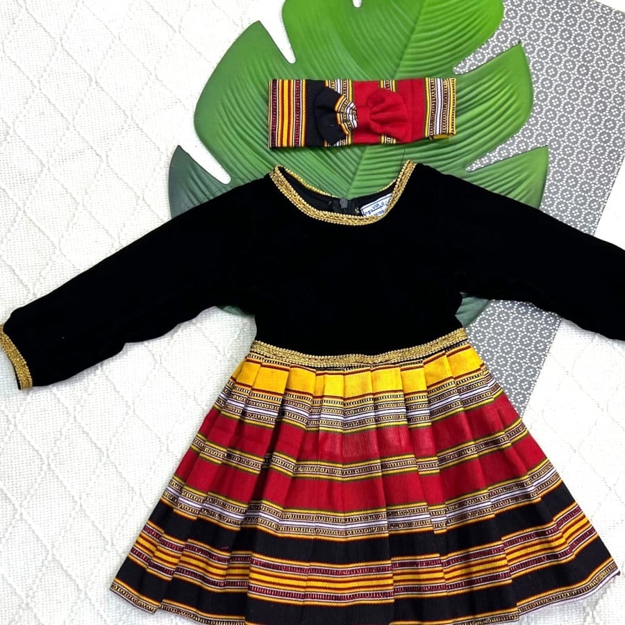 Traditional girls' dress + ribbon