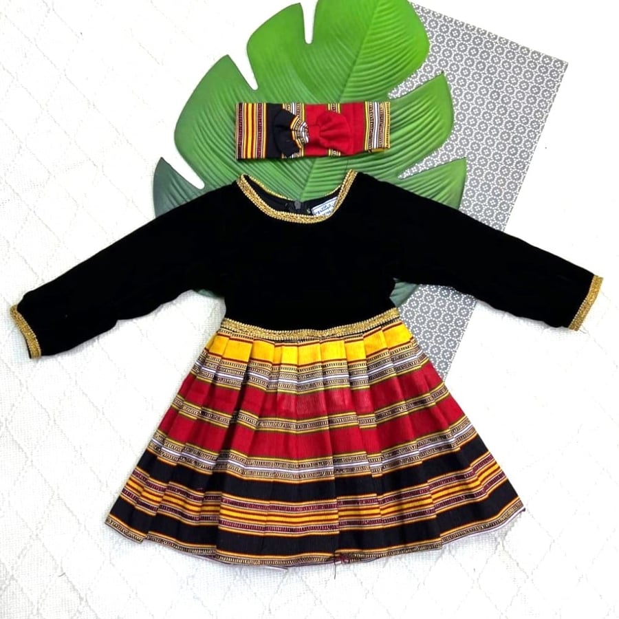 Traditional girls' dress + ribbon