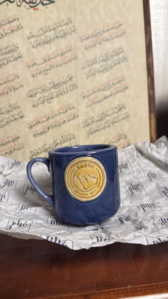 كوب النصر بالشعار الجديد