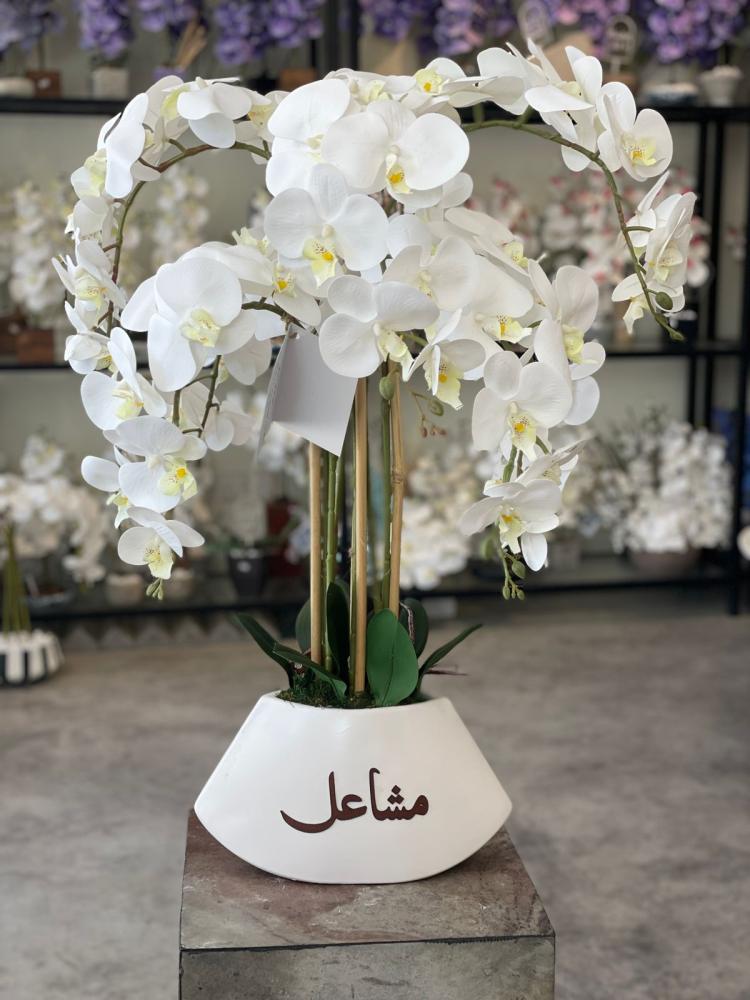 فازة السيراميك مع ورد الاوركيد