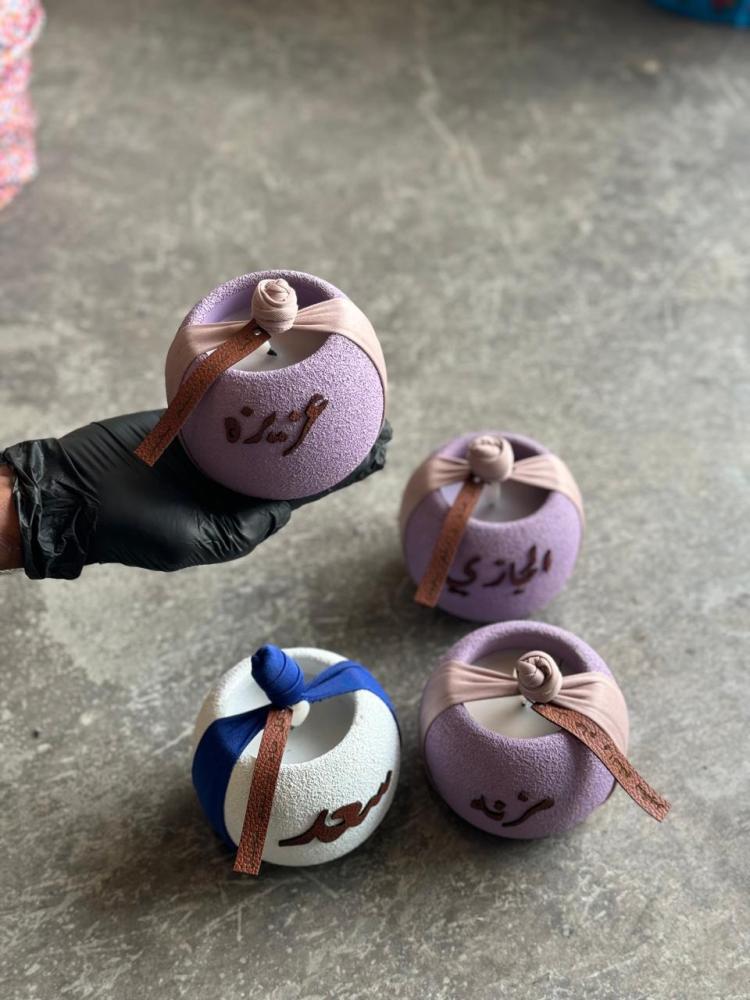Eid distributions, a lit candle