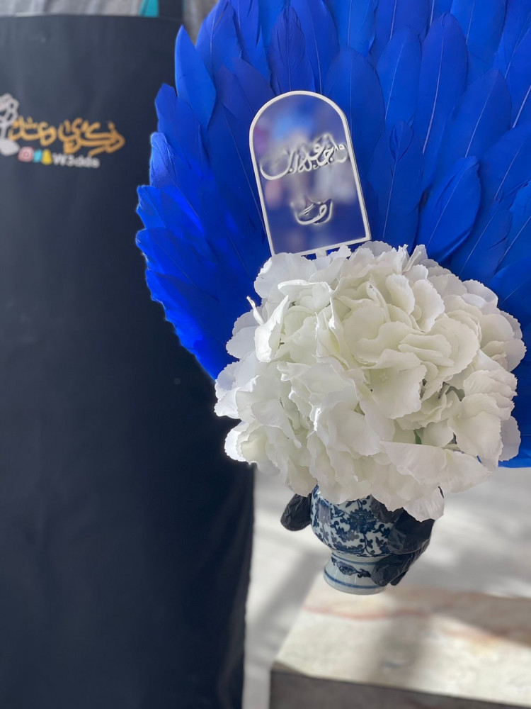 فازة بتنسيق الريش الجميل