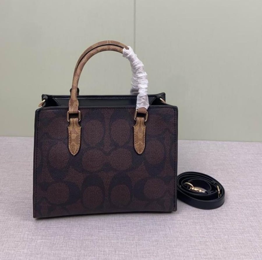 Coach Maggie Small Tote Bag in Blocked Signature Canvas.