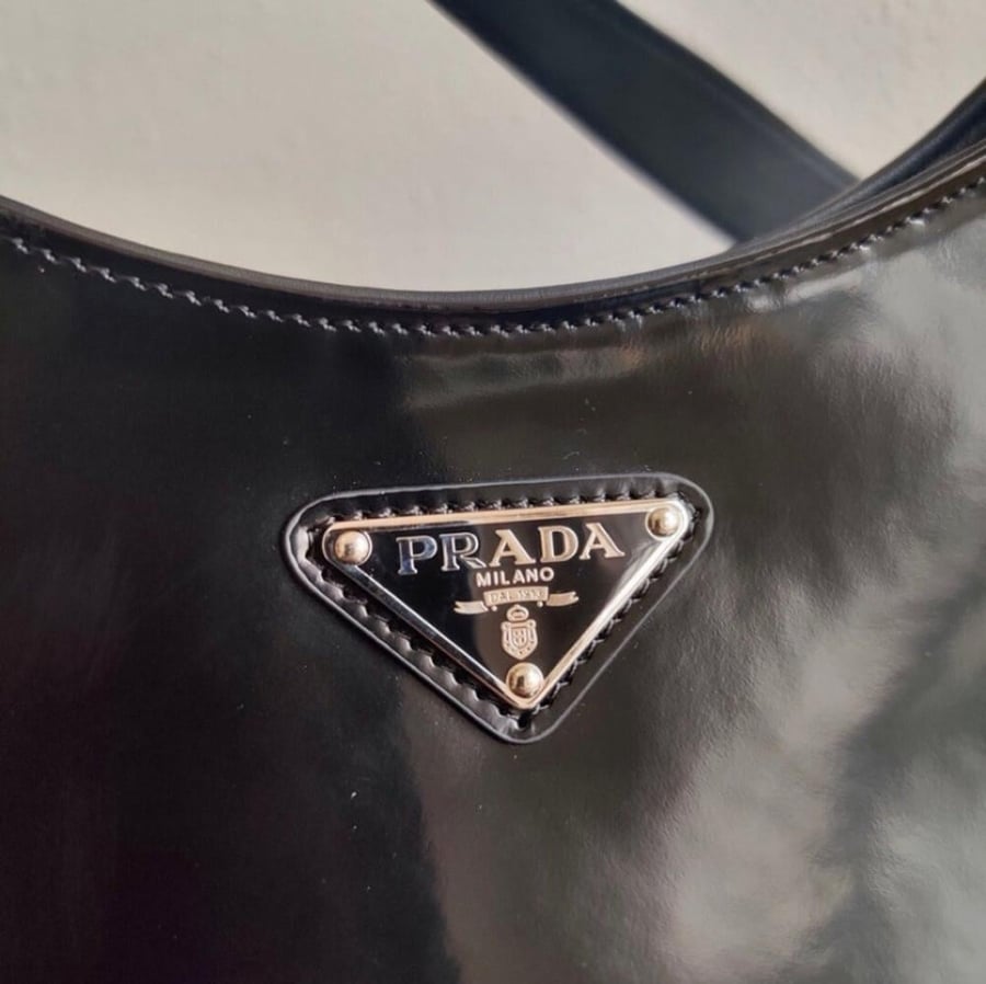 Prada Cleo brushed leather shoulder bag in black,