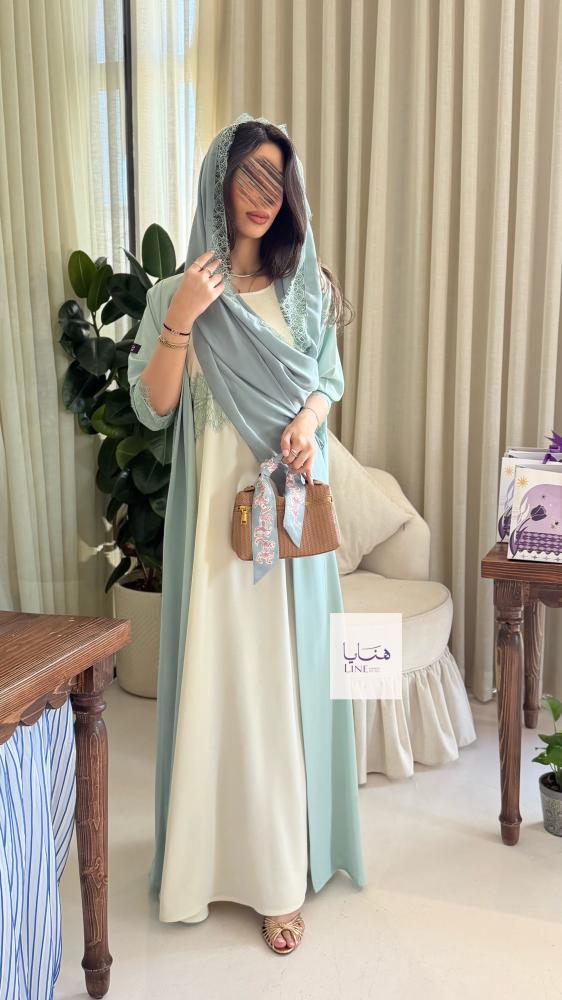 عباية نسيم بقماش كريب احساس مزينه بكلفه مع فستان داخلي سماوي