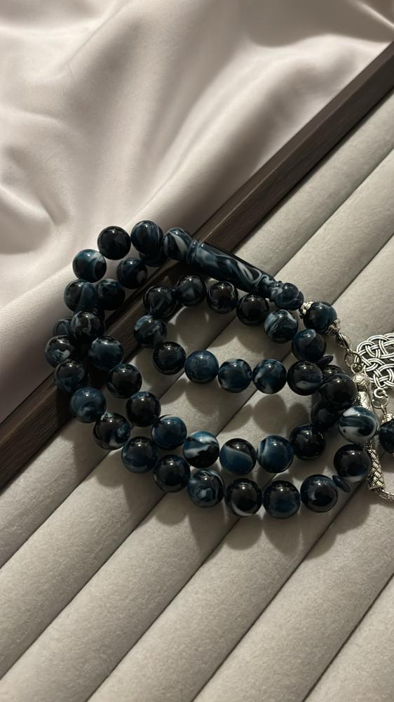 Blue wavy plastic prayer beads