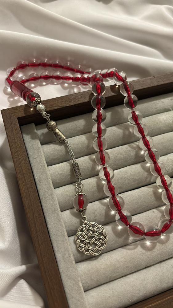 Transparent plastic prayer beads, red thread color
