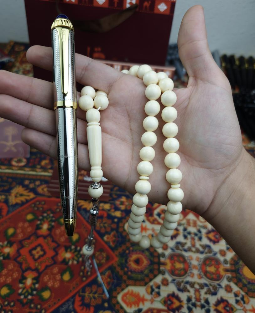 طقم قلم + سبحة بكلايت مجانا