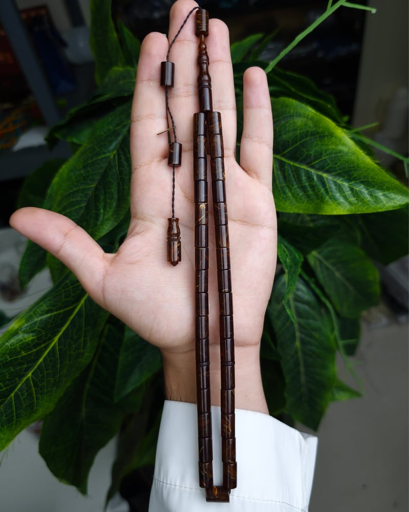Turkish prayer beads, story, pen, ownership